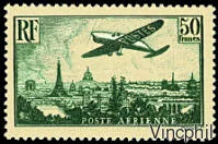 14 * Avion survolant Paris